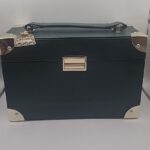 La Mer Emerald Medium Trunk – Pre-Owned, Good Condition