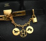 ⁦Hermès Breloque Olga Bag Charm Amulette Golden– With Box⁩ - الصورة ⁦3⁩
