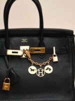 ⁦Hermès Breloque Olga Bag Charm Amulette Golden– With Box⁩ - الصورة ⁦2⁩