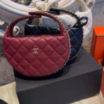 Chanel Round Quilted Mini Pouch