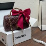 CHANEL Burgundy Mini Flap Bag with Satin Bow